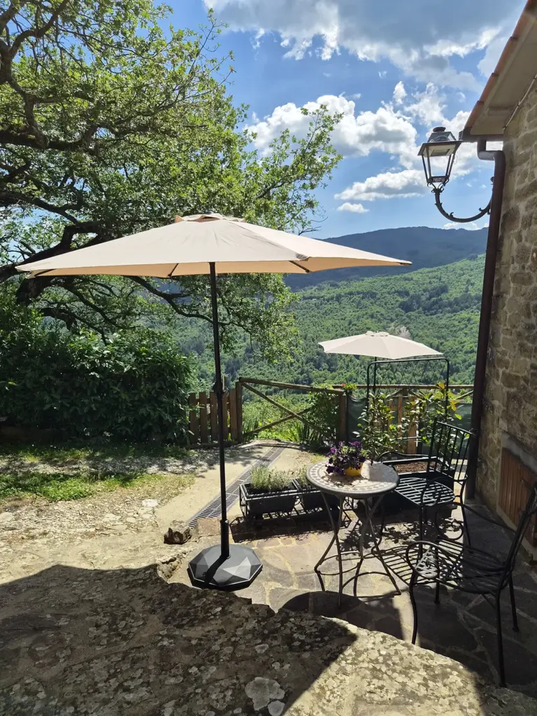 Privéterras van Appartement Terra met uitzicht over Toscane